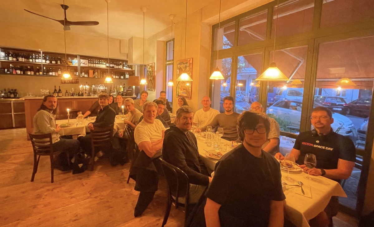 The cognee team around a long table at dinner in Berlin